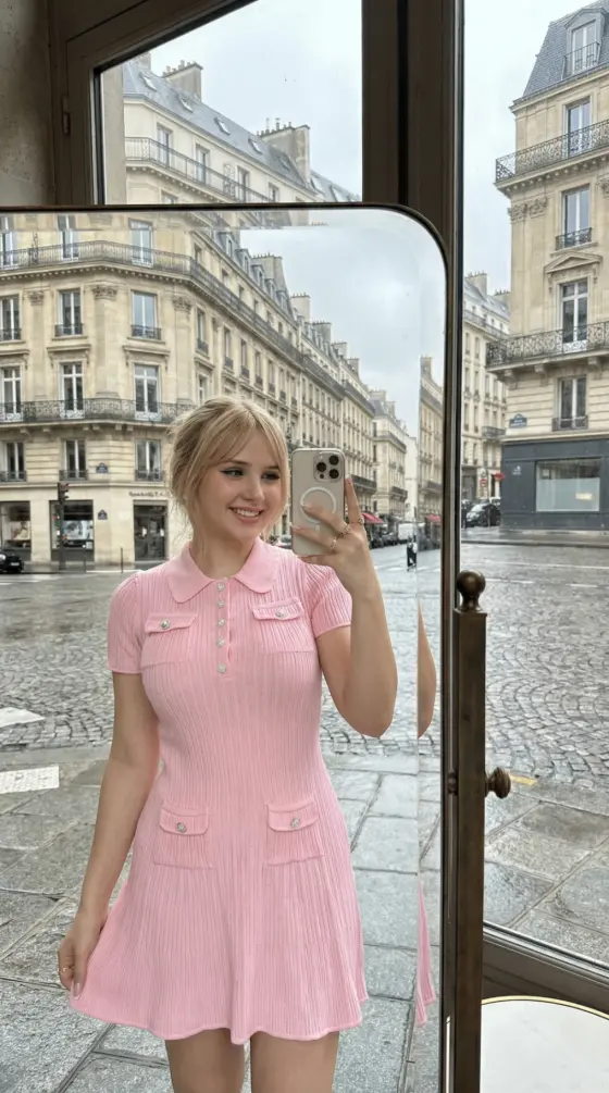 Chloé wearing the pink dress